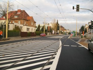 ul. Winogrady - nowy asfalt, nowa zieleń, nowe zasady ruchu. ul. Winogrady - nowy asfalt, nowa zieleń, nowe zasady ruchu.