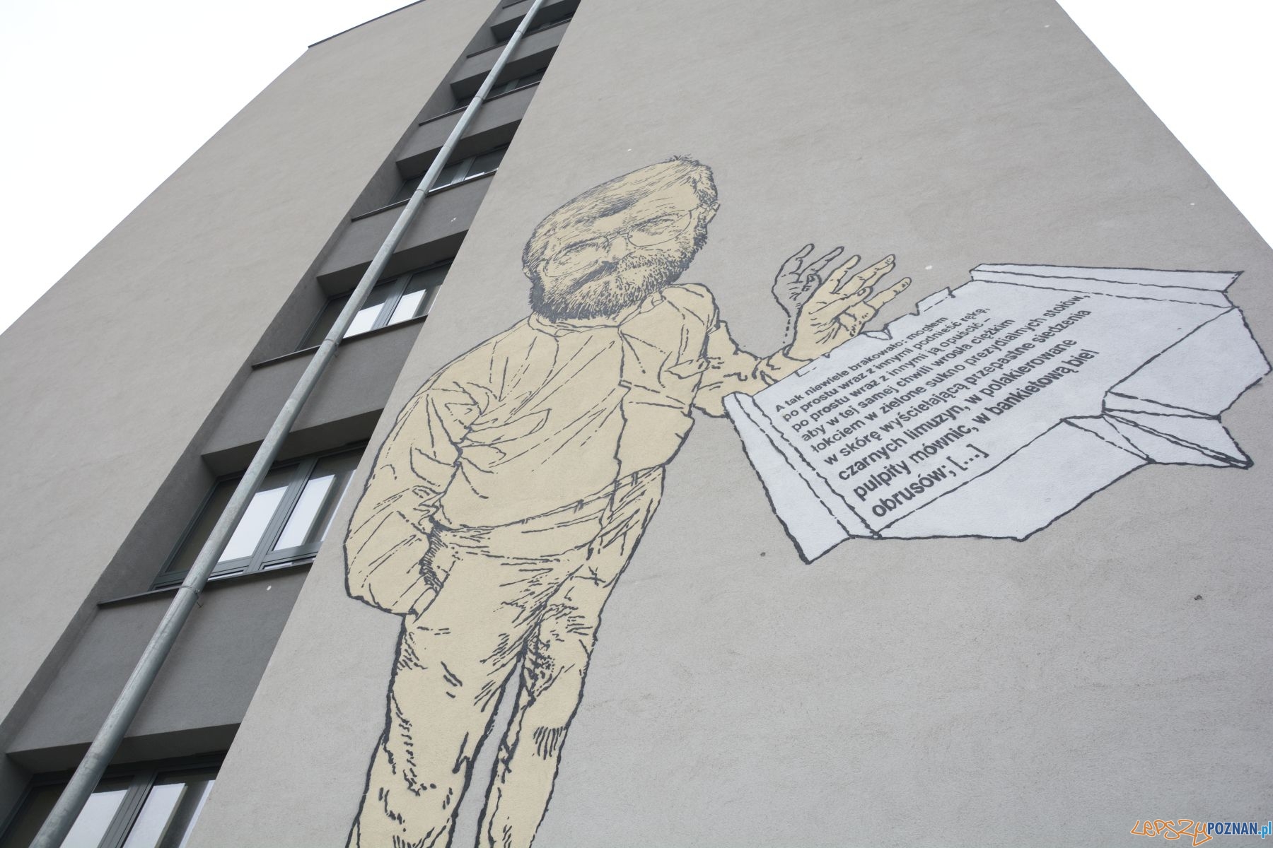 Mural Stanisława Barańczaka na budynku Collegium Novum UAM